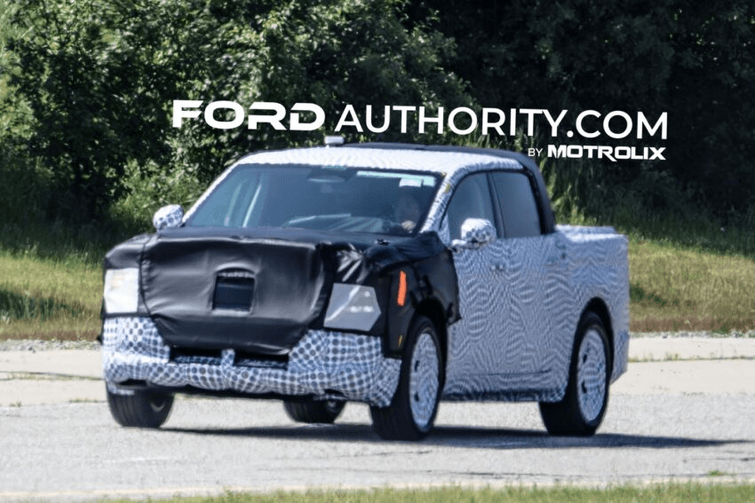 Camouflaged Ford Fathom electric pickup prototype viewed from the front